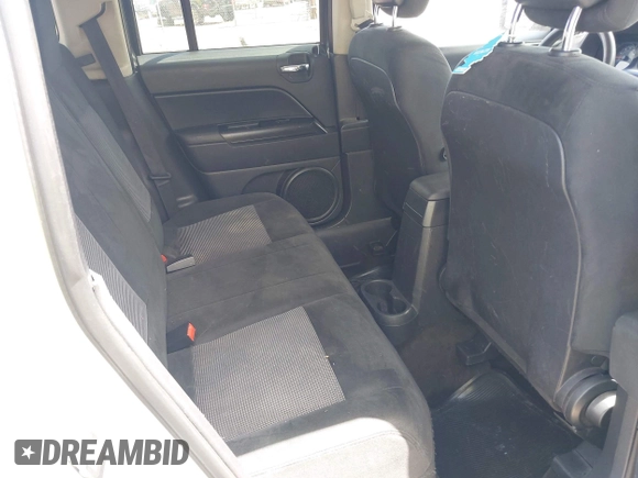 2015 Jeep Patriot Sport with VIN 1C4NJRBB8FD332050, listed as a IAAI auction lot 42283745 with 168,053 mi miles and . Bid and sale history available at DreamBid. Image 8.