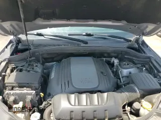 2020 Jeep Grand Cherokee High Altitude z VIN 1C4RJFCTXLC133672, wystawiony jako Copart lot #64632975 z przebiegiem 140 799 mil mil oraz Szkoda całkowita • Salvage title. Historia ofert i sprzedaży dostępna na DreamBid. Obrazek 17.