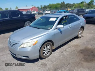 2007 Toyota Camry CE with VIN JTNBE46K173119853, listed as a IAAI auction lot 42133844 with 243,587 mi miles and . Bid and sale history available at DreamBid. Image 2.