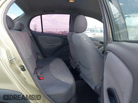 2000 Toyota ECHO with VIN JTDBT1230Y0074656, listed as a IAAI auction lot 42146740 with 230,990 mi miles and . Bid and sale history available at DreamBid. Image 8.