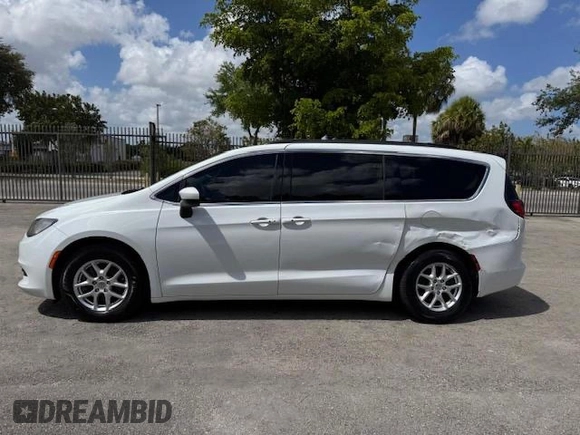 2020 Chrysler Voyager LXI with VIN 2C4RC1DG9LR144605, listed as a Copart auction lot 54107585 with 140,575 mi miles and Salvage Title. Bid and sale history available at carsss.com. Image 12.
