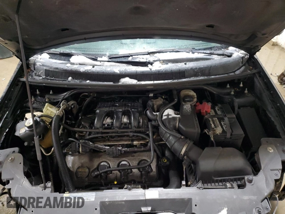 2009 Ford Taurus X Limited z VIN 1FMDK03W89GA00128, wystawiony jako Copart lot #87247904 z przebiegiem 188 844 mil mil oraz Szkoda całkowita • Salvage title. Historia ofert i sprzedaży dostępna na DreamBid. Obrazek 12.