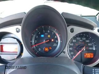 2014 Nissan 370Z Nismo with VIN JN1AZ4EHXEM634418, listed as a IAAI auction lot 41308580 with 84,074 mi miles and . Bid and sale history available at DreamBid. Image 7.