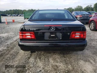 2000 Mercedes-Benz SL-Class with VIN WDBFA68F0YF190618, listed as a Copart auction lot 64791414 with 24,489 mi miles and Salvage Title. Bid and sale history available at carsss.com. Image 6.