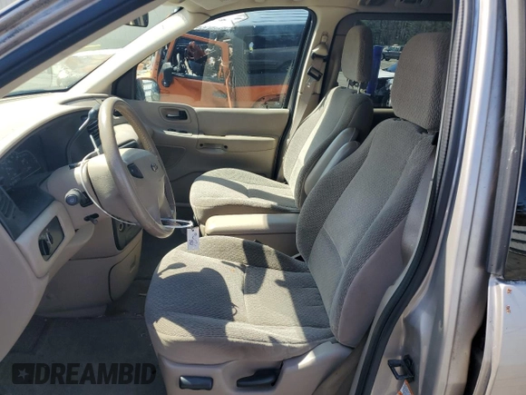 2003 Ford Windstar SE z VIN 2FMDA52473BB10747, wystawiony jako Copart lot #54301075 z przebiegiem 74 513 mil mil oraz Czysty tytuł • Clean title. Historia ofert i sprzedaży dostępna na DreamBid. Obrazek 7.