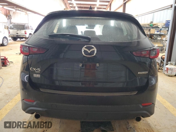 2023 Mazda CX-5 2.5 S with VIN JM3KFBAMXP0209820, listed as a Copart auction lot 43739645 with 9,653 mi miles and Salvage Title. Bid and sale history available at carsss.com. Image 6.