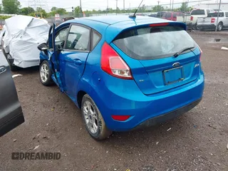 2015 Ford Fiesta SE z VIN 3FADP4EJ9FM133020, wystawiony jako IAAI lot #42302738 z przebiegiem 115 669 mil mil oraz . Historia ofert i sprzedaży dostępna na DreamBid. Obrazek 3.