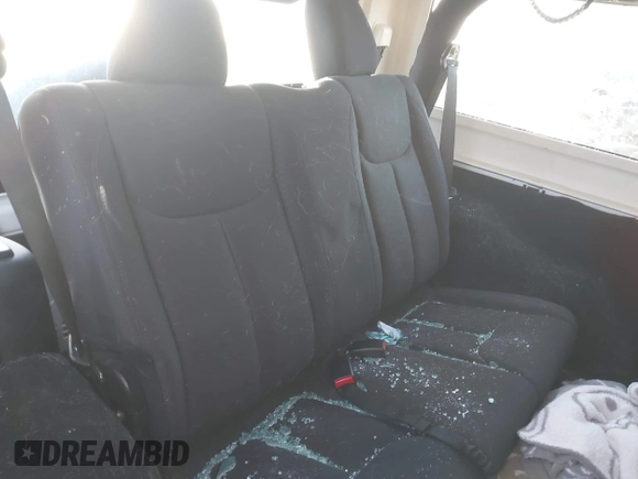 2015 Jeep Wrangler Sport with VIN 1C4AJWAG0FL516351, listed as a IAAI auction lot 41178594 with 49,700 mi miles and . Bid and sale history available at DreamBid. Image 8.