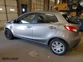 2013 Mazda Mazda2 Sport with VIN JM1DE1KY4D0170766, listed as a Copart auction lot 68338244 with 114,165 mi miles and Salvage Title. Bid and sale history available at carsss.com. Image 2.