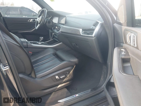 2020 BMW X5 sDrive40i with VIN 5UXCR4C06LLW64438, listed as a IAAI auction lot 41520407 with 89,868 mi miles and . Bid and sale history available at DreamBid. Image 5.
