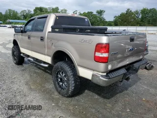 2004 Ford F-150 XLT with VIN 1FTPW14564KD21754, listed as a Copart auction lot 59007395 with 171,537 mi miles and Salvage title. Bid and sale history available at DreamBid. Image 2.