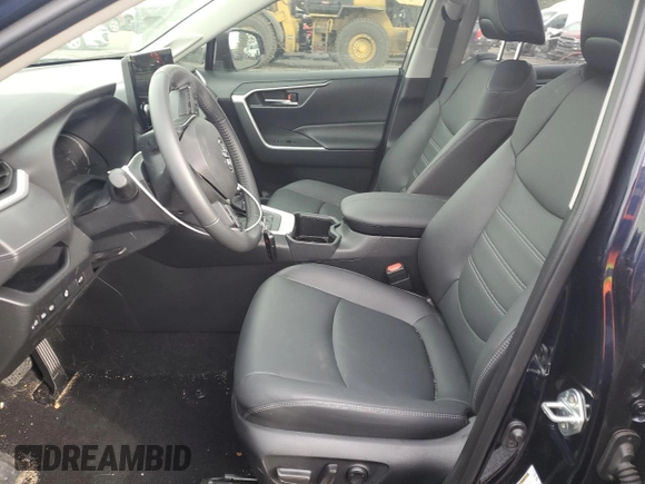 2024 Toyota RAV4 Hybrid XLE Premium with VIN JTMB6RFV4RD137902, listed as a Copart auction lot 86013364 with 9,330 mi miles and Salvage Title. Bid and sale history available at DreamBid. Image 7.
