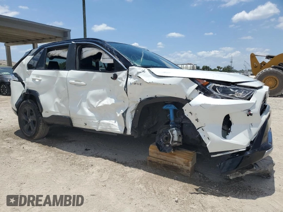2021 Toyota RAV4 Hybrid XSE with VIN 4T3E6RFV3MU061808, listed as a Copart auction lot 57048025 with 20,614 mi miles and Salvage title. Bid and sale history available at DreamBid. Image 4.