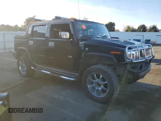 2005 Hummer H2 SUT with VIN 5GRGN22U15H101289, listed as a Copart auction lot 84107974 with 0 mi miles and Salvage Title. Bid and sale history available at carsss.com. Image 4.
