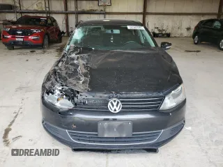 2013 Volkswagen Jetta SE with VIN 3VWDX7AJXDM427263, listed as a Copart auction lot 52502585 with 243,457 mi miles and Salvage title. Bid and sale history available at DreamBid. Image 5.