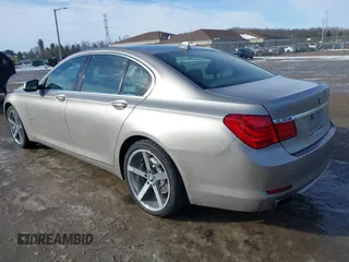 2012 BMW 7 Series 740i with VIN WBAKA4C58CDS99381, listed as a IAAI auction lot 41655715 with 112,731 mi miles and . Bid and sale history available at DreamBid. Image 3.