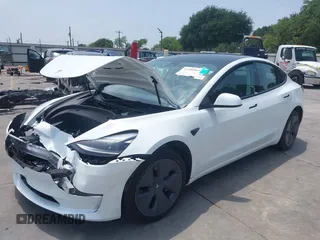 2023 Tesla Model 3 z VIN 5YJ3E1EA3PF604076, wystawiony jako IAAI lot #42181964 z przebiegiem 23 207 mil mil oraz . Historia ofert i sprzedaży dostępna na DreamBid. Obrazek 2.