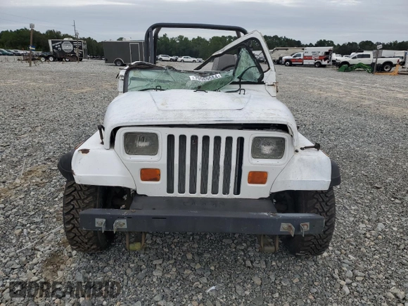 1990 Jeep Wrangler "S" with VIN 2J4FY19E6LJ528040, listed as a Copart auction lot 70989084 with 176,416 mi miles and Salvage Title. Bid and sale history available at carsss.com. Image 5.
