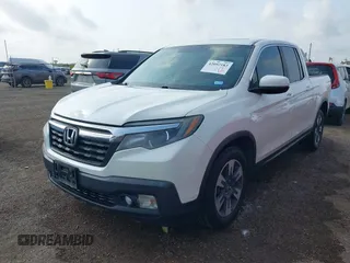 2019 Honda Ridgeline RTL z VIN 5FPYK2F54KB007184, wystawiony jako IAAI lot #42092183 z przebiegiem Nie podano mil oraz . Historia ofert i sprzedaży dostępna na DreamBid. Obrazek 6.