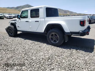 2022 Jeep Gladiator Rubicon z VIN 1C6JJTBG4NL135430, wystawiony jako Copart lot #52581015 z przebiegiem 54 553 mil mil oraz Szkoda całkowita • Salvage title. Historia ofert i sprzedaży dostępna na DreamBid. Obrazek 2.