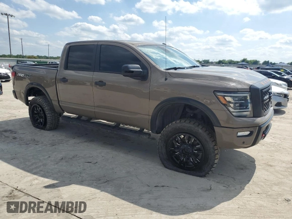 2021 Nissan Titan Pro-4X с VIN 1N6AA1ED5MN523913, выставлен на аукционе Copart как лот 56371695 с пробегом 36 785 миль миль и Списание • Salvage title. История ставок и продаж доступна на DreamBid. Изображение 4.