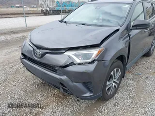 2018 Toyota RAV4 LE with VIN JTMBFREV2JJ727457, listed as a IAAI auction lot 41758208 with 65,740 mi miles. Bid and sale history available at carsss.com. Image 6.