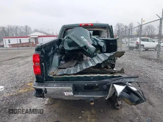 2014 Chevrolet Silverado 1500 LT with VIN 3GCUKREC1EG516826, listed as a IAAI auction lot 41119573 with 164,844 mi miles and . Bid and sale history available at DreamBid. Image 17.