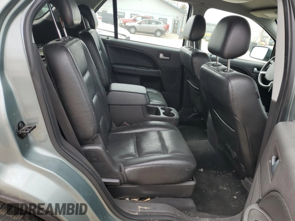 2005 Ford Freestyle Limited z VIN 1FMDK061X5GA13201, wystawiony jako Copart lot #48371765 z przebiegiem 134 155 mil mil oraz Szkoda całkowita • Salvage title. Historia ofert i sprzedaży dostępna na DreamBid. Obrazek 10.
