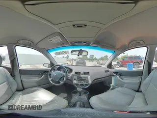2007 Ford Focus S z VIN 1FAHP37N47W245222, wystawiony jako Copart lot #57293025 z przebiegiem 102 552 mil mil oraz Szkoda całkowita • Salvage title. Historia ofert i sprzedaży dostępna na DreamBid. Obrazek 14.