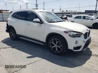 2018 BMW X1 xDrive28i with VIN WBXHT3C35J5L26952, listed as a Copart auction lot 51715035 with 63,306 mi miles and Salvage Title. Bid and sale history available at carsss.com. Image 4.