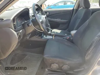 2006 Nissan Sentra S z VIN 3N1CB51D46L595164, wystawiony jako Copart lot #57294625 z przebiegiem 136 564 mil mil oraz Szkoda całkowita • Salvage title. Historia ofert i sprzedaży dostępna na DreamBid. Obrazek 7.