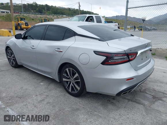 2020 Nissan Maxima SV with VIN 1N4AA6CVXLC380646, listed as a IAAI auction lot 42041422 with 99,579 mi miles and . Bid and sale history available at DreamBid. Image 3.
