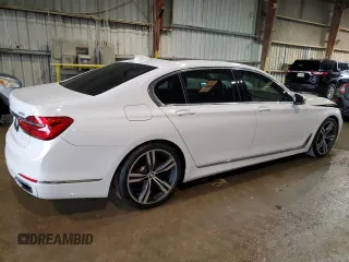 2017 BMW 7 Series 740i with VIN WBA7E2C52HG739888, listed as a Copart auction lot 72703492 with 94,241 mi miles. Bid and sale history available at carsss.com. Image 3.