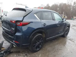 2022 Mazda CX-5 2.5 Turbo with VIN JM3KFBAY6N0545688, listed as a IAAI auction lot 41456576 with 32,376 mi miles and . Bid and sale history available at carsss.com. Image 4.