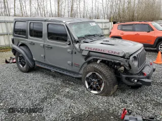 2018 Jeep Wrangler Unlimited Rubicon with VIN 1C4HJXFNXJW196460, listed as a Copart auction lot 49681715 with 71,187 mi miles and Salvage title. Bid and sale history available at DreamBid. Image 4.