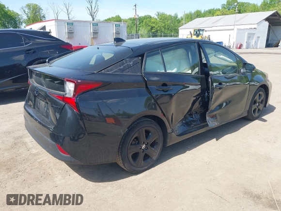 2022 Toyota Prius L Eco with VIN JTDKAMFU0N3175619, listed as a IAAI auction lot 42098135 with 72,984 mi miles and . Bid and sale history available at DreamBid. Image 4.