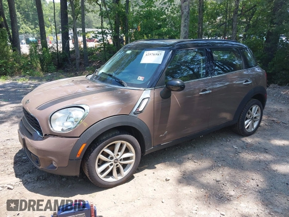 2012 MINI Countryman S with VIN WMWZC5C57CWL62344, listed as a IAAI auction lot 42576587 with 191,597 mi miles and . Bid and sale history available at DreamBid. Image 2.