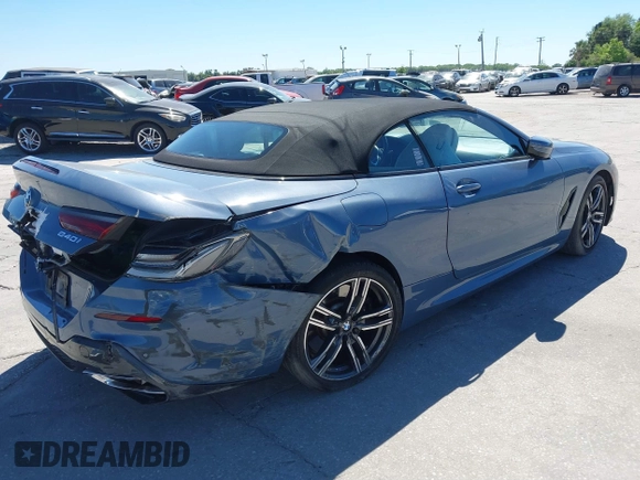 2022 BMW 8 Series 840i with VIN WBADZ4C02NCH76601, listed as a IAAI auction lot 41828172 with 23,168 mi miles. Bid and sale history available at carsss.com. Image 4.