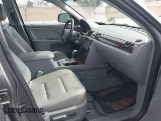 2006 Ford Five Hundred SEL with VIN 1FAFP24106G147137, listed as a IAAI auction lot 41823911 with 132,936 mi miles. Bid and sale history available at carsss.com. Image 5.