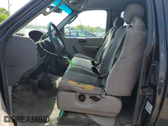 2003 Ford F-150 XL with VIN 2FTPX18L13CA34024, listed as a Copart auction lot 62133645 with 224,922 mi miles and Salvage title. Bid and sale history available at DreamBid. Image 7.