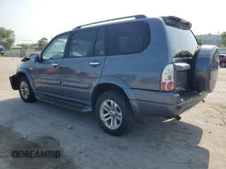 2004 Suzuki XL7 LX z VIN JS3TX92V844109991, wystawiony jako Copart lot #58934415 z przebiegiem 205 951 mil mil oraz Szkoda całkowita • Salvage title. Historia ofert i sprzedaży dostępna na DreamBid. Obrazek 2.