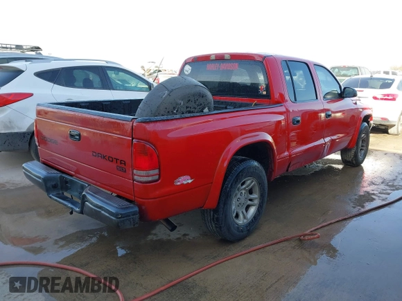 2003 Dodge Dakota Sport with VIN 1D7HL38X63S362491, listed as a IAAI auction lot 41642370 with 299,300 mi miles. Bid and sale history available at carsss.com. Image 4.