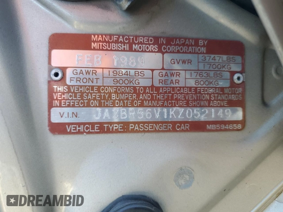 1989 Mitsubishi Galant with VIN JA3BR56V1KZ052149, listed as a Copart auction lot 69987544 with 74,232 mi miles and Salvage Title. Bid and sale history available at DreamBid. Image 12.