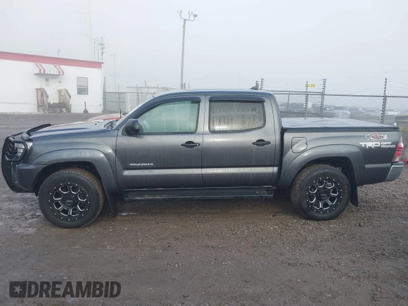 2015 Toyota Tacoma with VIN 3TMLU4EN7FM201302, listed as a IAAI auction lot 41666606 with 200,504 mi miles and . Bid and sale history available at DreamBid. Image 15.