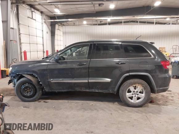 2011 Jeep Grand Cherokee 70th Anniversary with VIN 1J4RR4GG3BC745652, listed as a IAAI auction lot 41133698 with 217,948 mi miles. Bid and sale history available at carsss.com. Image 14.