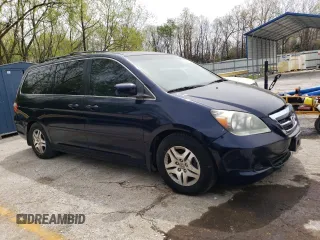 2007 Honda Odyssey EX with VIN 5FNRL38477B101619, listed as a Copart auction lot 54134505 with 129,468 mi miles and Clean title. Bid and sale history available at DreamBid. Image 4.