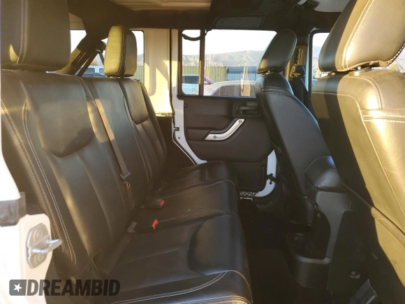 2015 Jeep Wrangler Unlimited Rubicon with VIN 1C4BJWFG5FL659017, listed as a Copart auction lot 84435034 with 69,915 mi miles and Salvage Title. Bid and sale history available at carsss.com. Image 10.