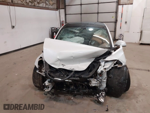 2021 Tesla Model 3 Performance with VIN 5YJ3E1ECXMF991836, listed as a IAAI auction lot 41830519 with Not Provided miles and . Bid and sale history available at carsss.com. Image 12.