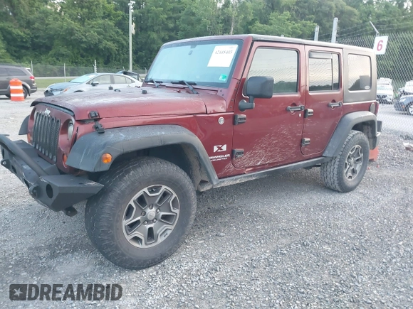 2008 Jeep Wrangler Unlimited X z VIN 1J4GA39128L568988, wystawiony jako IAAI lot #42445403 z przebiegiem 198 032 mil mil oraz . Historia ofert i sprzedaży dostępna na DreamBid. Obrazek 18.