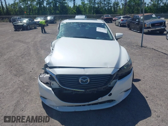 2016 Mazda Mazda6 i Grand Touring with VIN JM1GJ1W55G1443186, listed as a IAAI auction lot 42063716 with 114,263 mi miles. Bid and sale history available at carsss.com. Image 12.